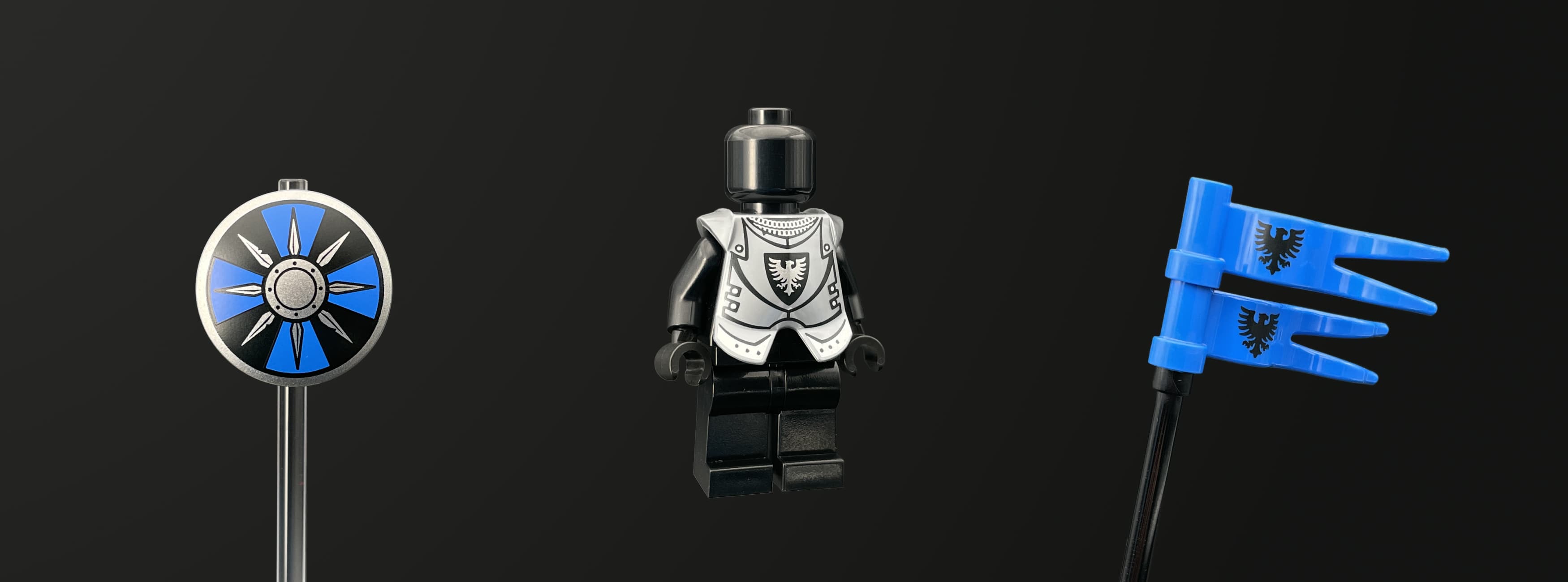 The header image of the onlineshop of Cultbricks custom premium prints. Showing a printed round shield, a printed armor breastplate and printed flags. All in the colors and design of the black falcons.